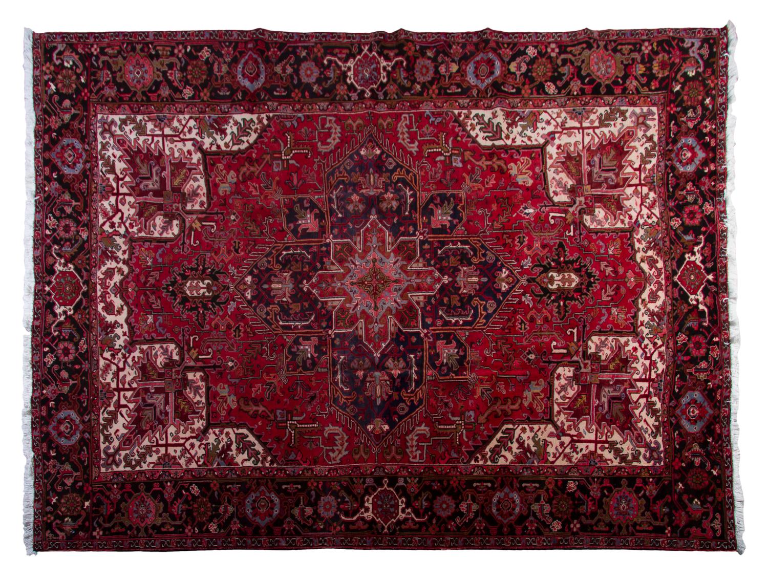 A Heriz Wool Rug, 12 feet 9 inches x 10 feet 3 inches.