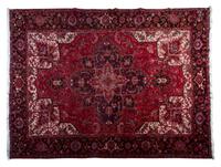 A Heriz Wool Rug, 12 feet 9 inches x 10 feet 3 inches.