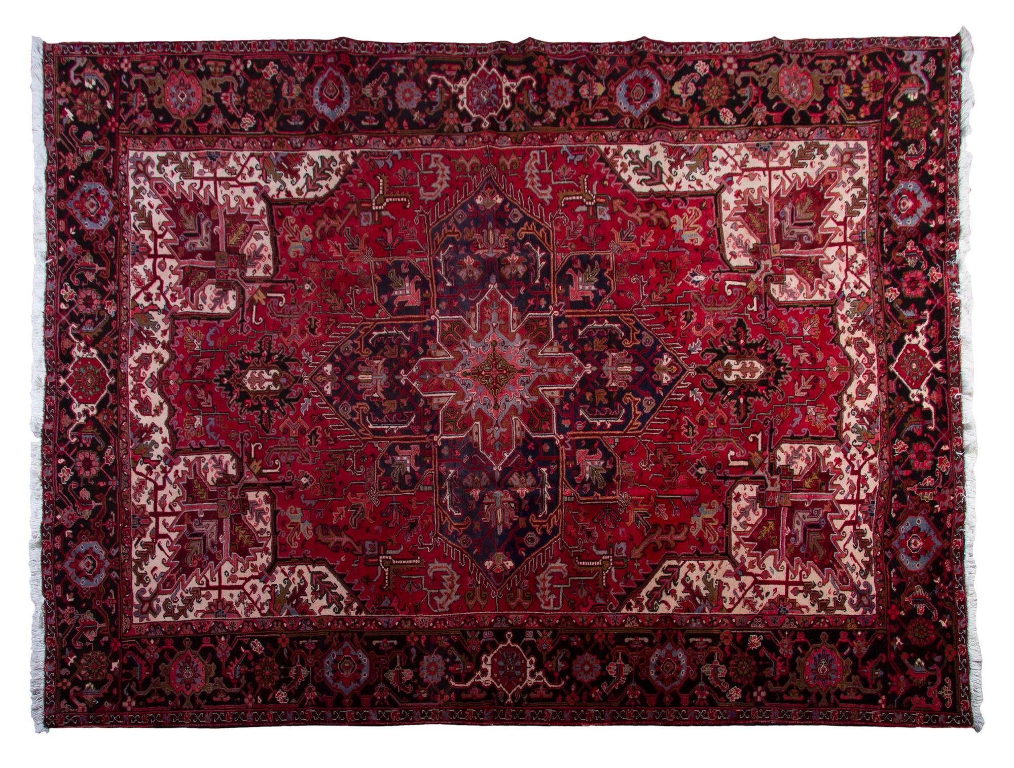 A Heriz Wool Rug, 12 feet 9 inches x 10 feet 3 inches.