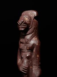 An Egyptian Stone Striding Bastet and an Egyptian Bronze Anubis