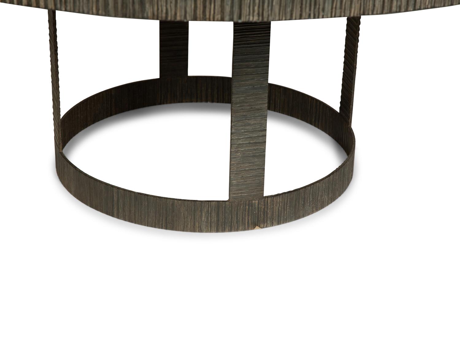 A Contemporary Carved Wood Circular Dining Table