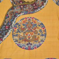 A Chinese Yellow Kesi Dragon Roundel Robe, Late 19th Century 清晚期 黃地緙絲龍袍