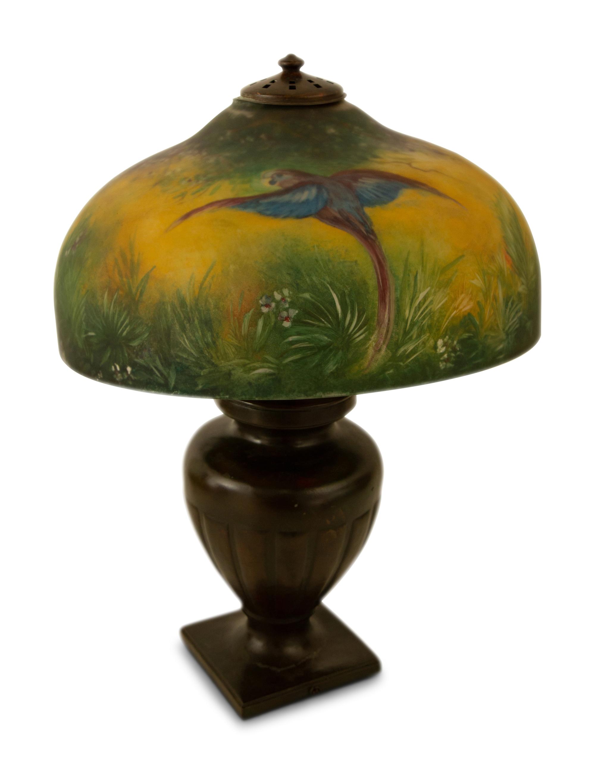 A Handel Patinated Metal Table Lamp With Reverse-Painted Glass Shade