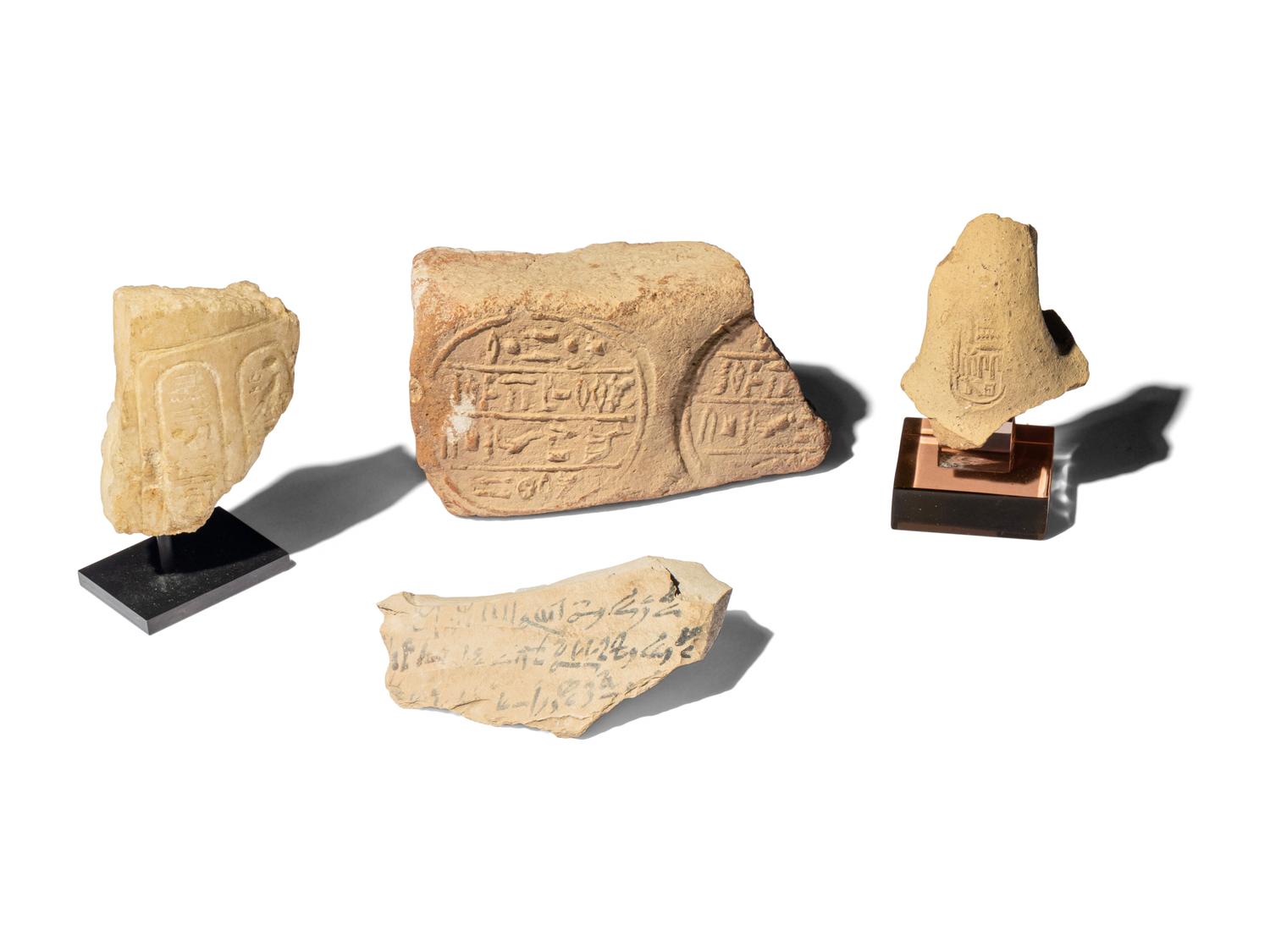 Nine Egyptian Stone Vessels and Fragments with Hieroglyphs and Script