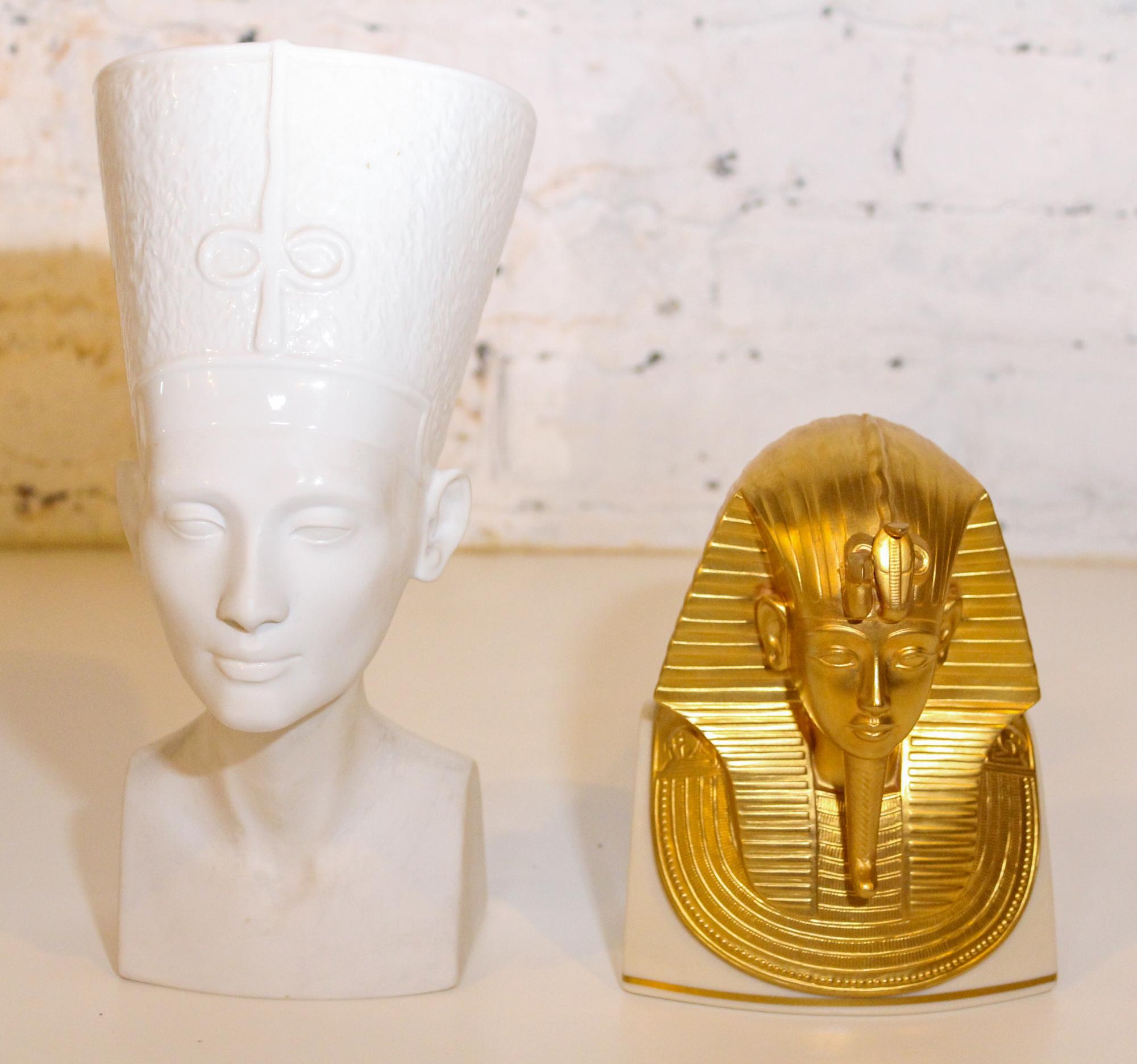 Two Egyptian Style Porcelain Busts Height of first 11 1/2 inches.