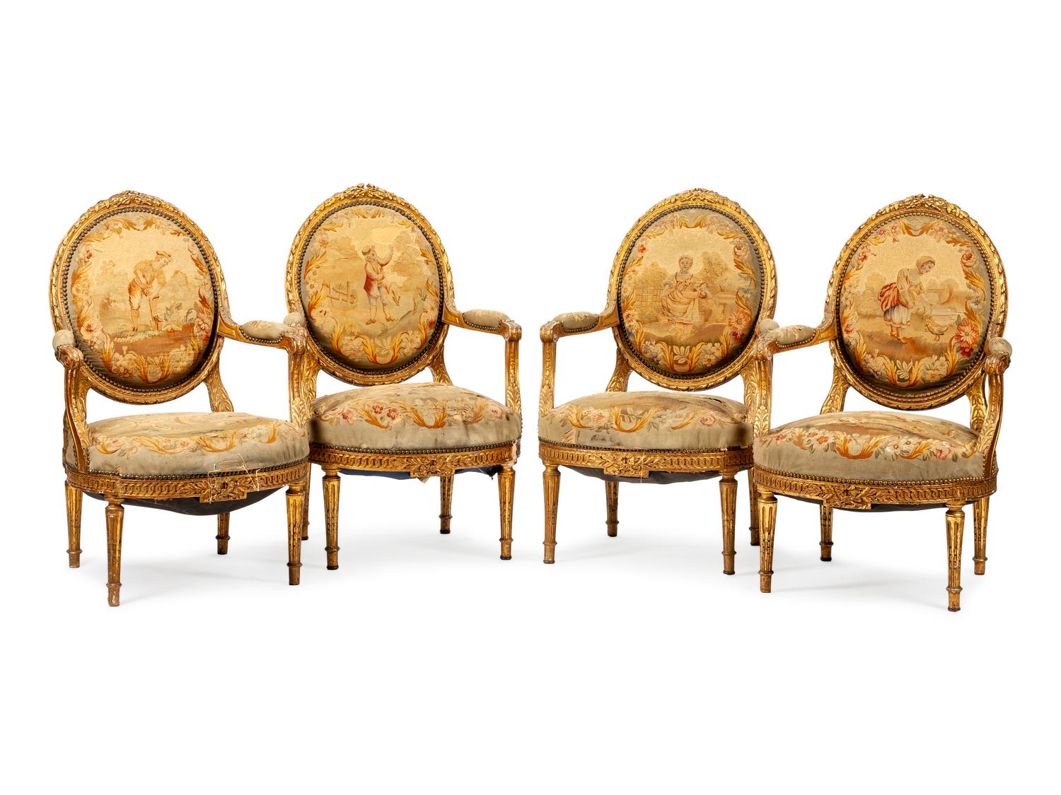 A Set of Four Louis XVI Style Aubusson Tapestry Upholstered Giltwood Fauteuils — CIRCA 1900