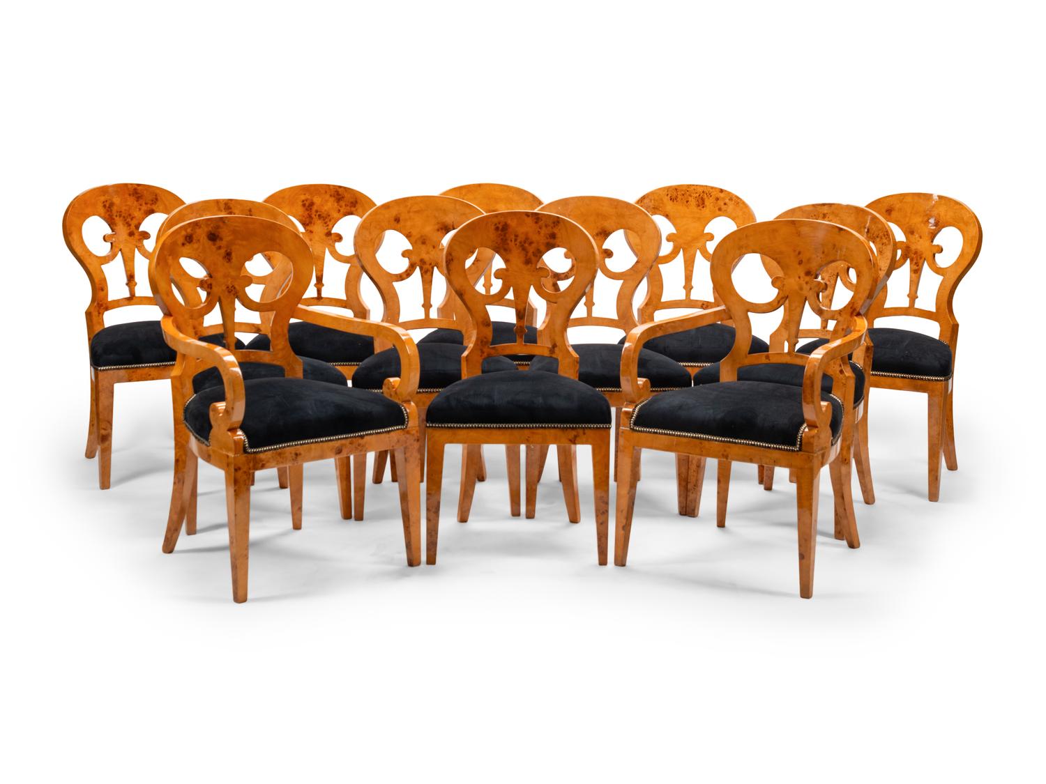 A Set of Twelve Biedermeier Style Burlwood Dining Chairs