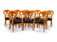 A Set of Twelve Biedermeier Style Burlwood Dining Chairs