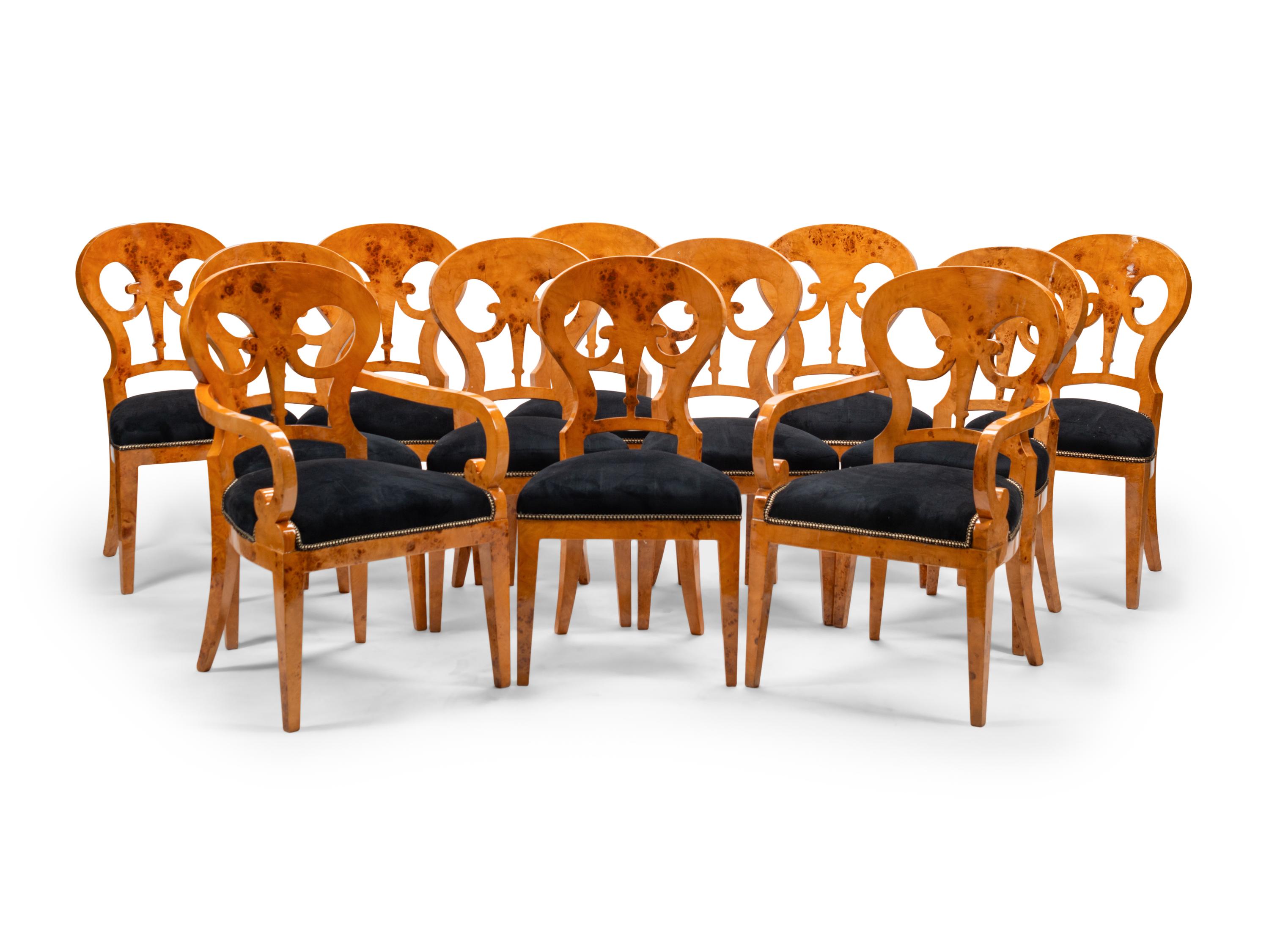 A Set of Twelve Biedermeier Style Burlwood Dining Chairs