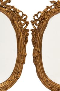 A Pair of Italian Rococo Style Gilded Mirrors