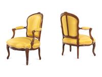 A Set of Four Louis XV Style Walnut Fauteuils
