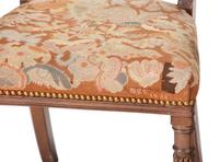 Seven Regency Style Brass Inlaid Mahogany Chairs