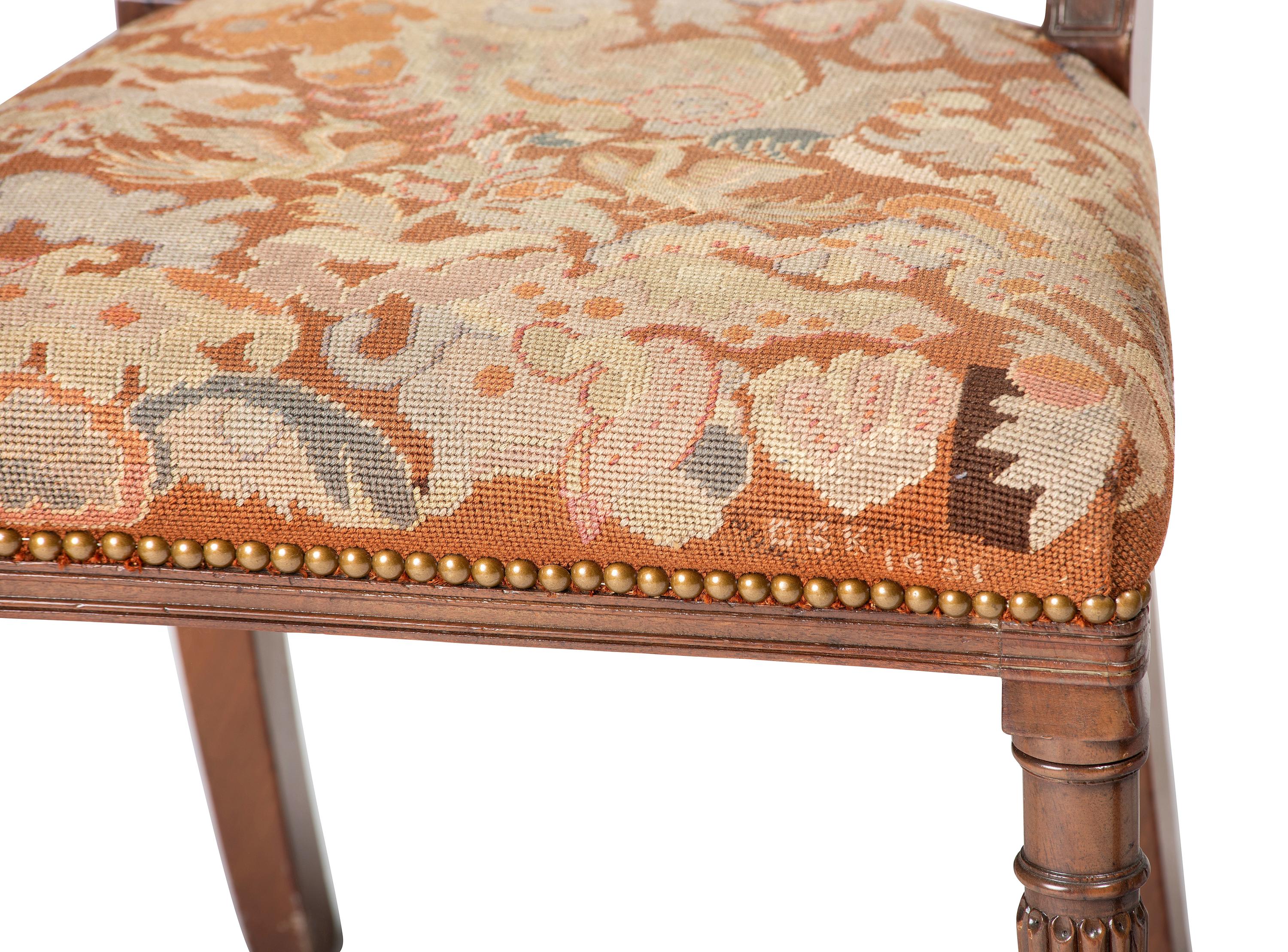 Seven Regency Style Brass Inlaid Mahogany Chairs