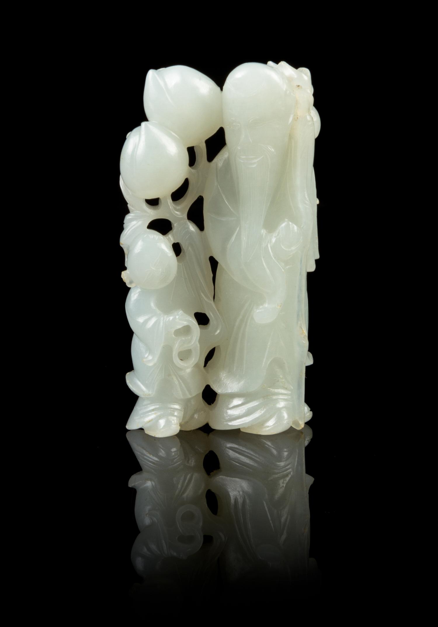 A Chinese White Jade Shoulao and Boy 18TH/19TH CENTURY Height 2 1/4 inches. — 18TH/19TH CENTURY