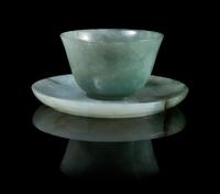 A Celadon Jadeite Cup and Saucer Diameter of larger 3 1/8 inches.