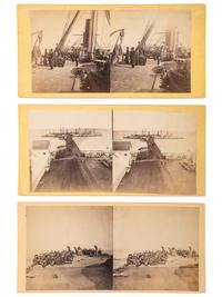 [CIVIL WAR]. COOLEY, Sam A., photographer. A group of 3 stereoviews of deck scenes, highlighted by religious service aboard the Monitor Montauk .