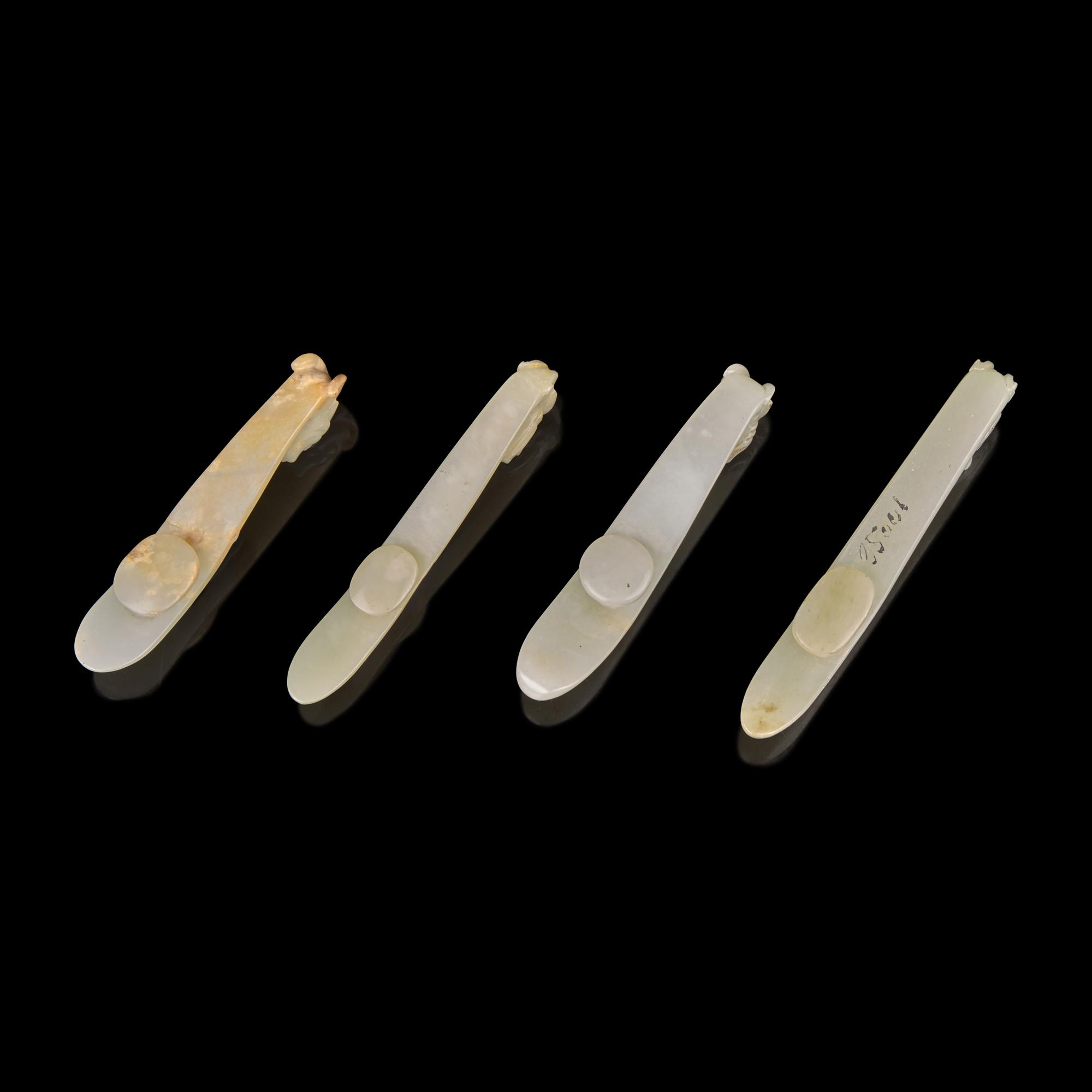 Four Pale Celadon Jade "Dragon" Belthooks, Qing Dynasty 清 青玉龍鉤四件