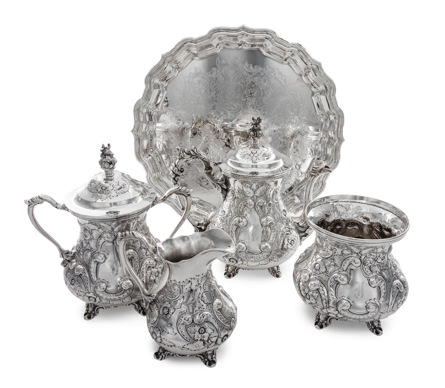 An American Coin Silver Tea Service, Conrad Bard & Son, Philadelphia, Mid 19th Century, comprising a teapot, a creamer, a sugar and a w