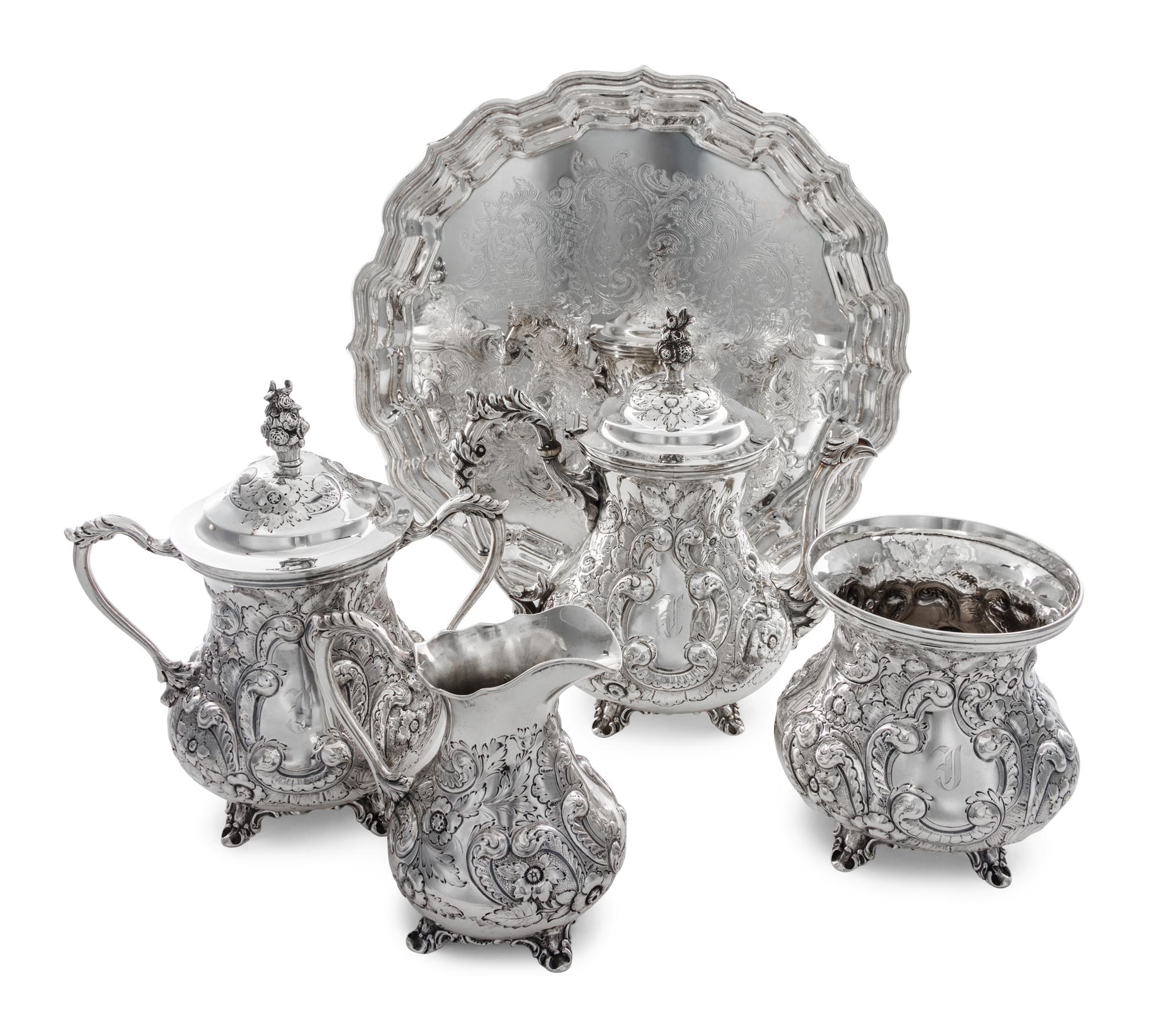 An American Coin Silver Tea Service, Conrad Bard & Son, Philadelphia, Mid 19th Century, comprising a teapot, a creamer, a sugar and a w