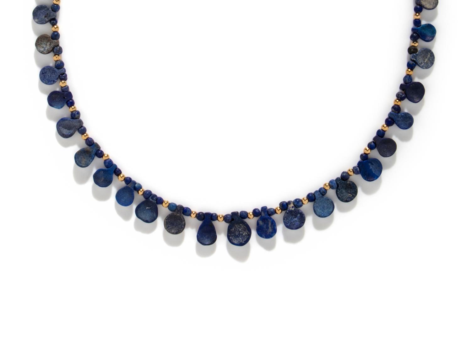 A Western Asiatic Lapis Lazuli and Gold Bead Necklace