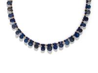 A Western Asiatic Lapis Lazuli and Gold Bead Necklace