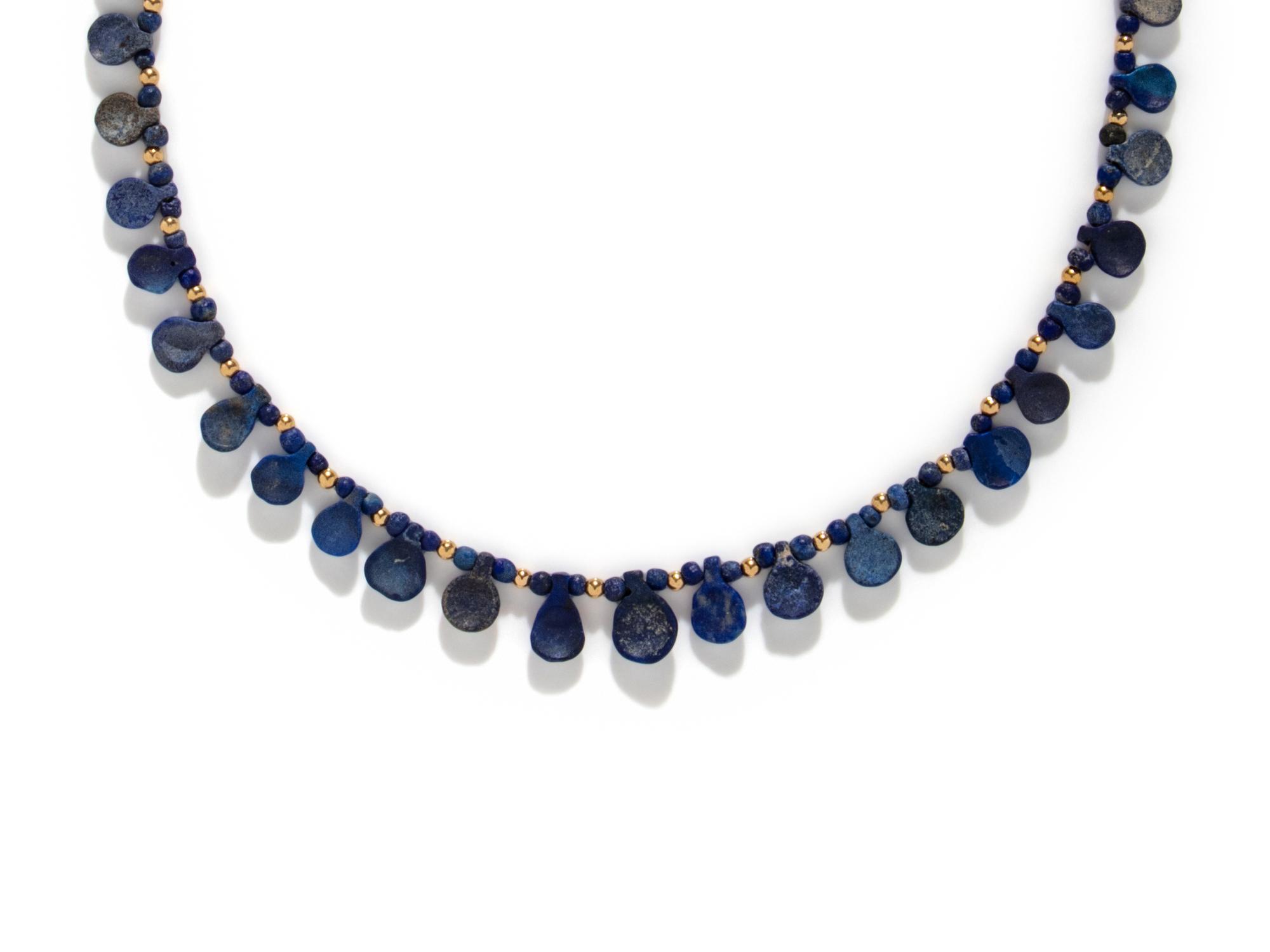 A Western Asiatic Lapis Lazuli and Gold Bead Necklace