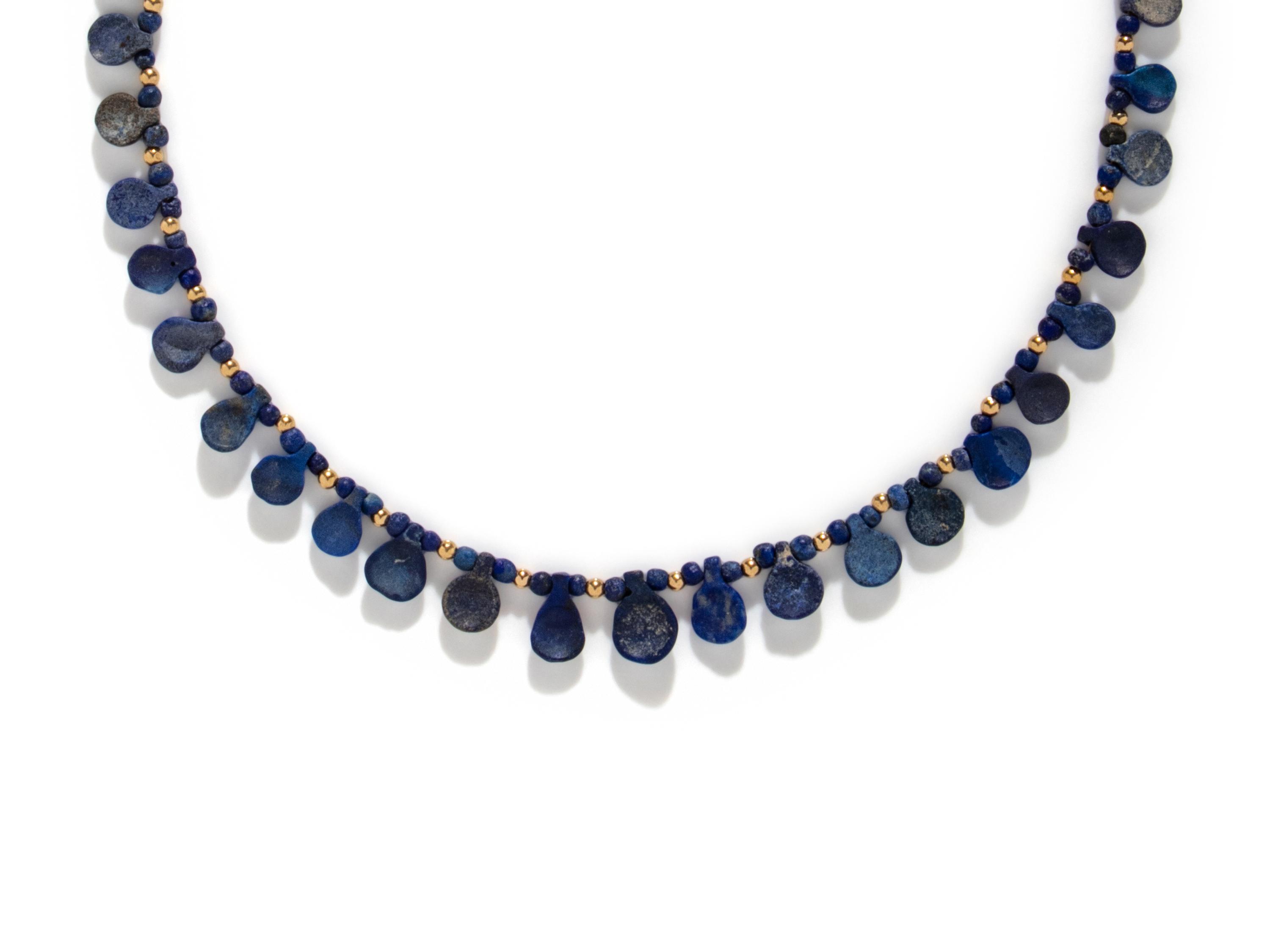 A Western Asiatic Lapis Lazuli and Gold Bead Necklace