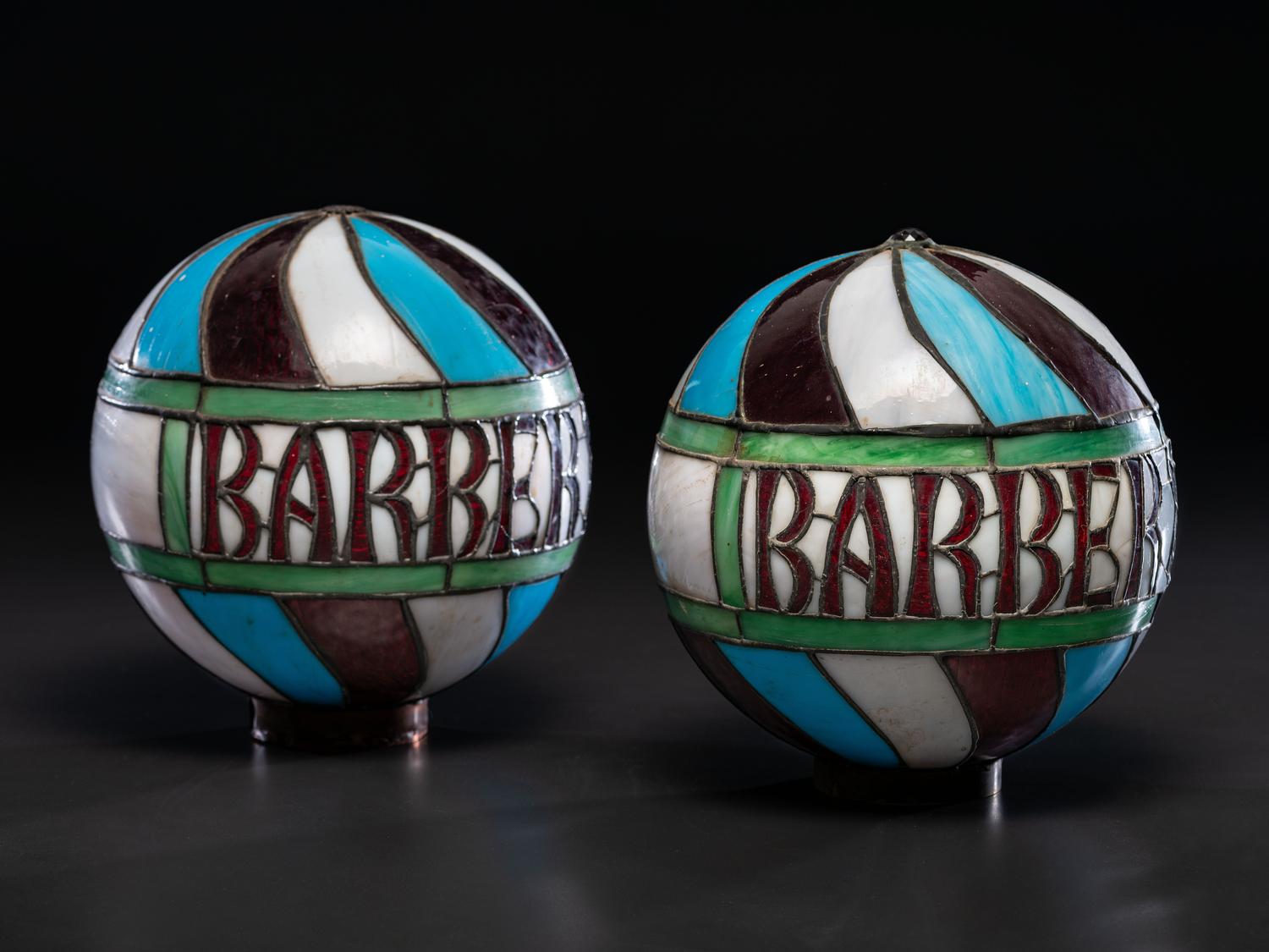 A Pair of Leaded Glass Barber Pole Globes
