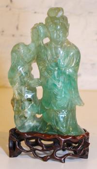 A Green Quartz Figural Group Height 8 1/2 inches.