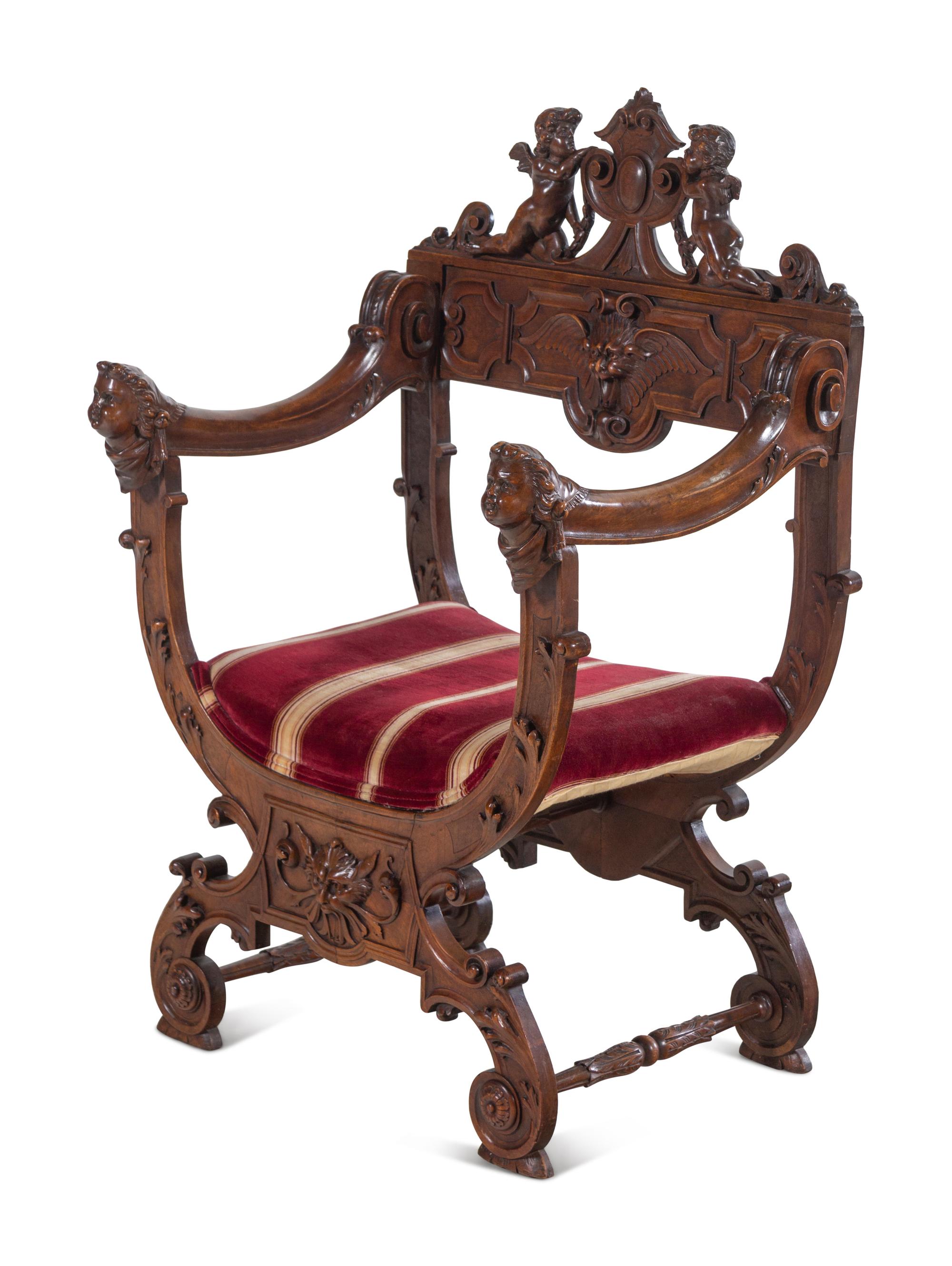 A Renaissance Revival Carved Walnut Savonarola Chair
