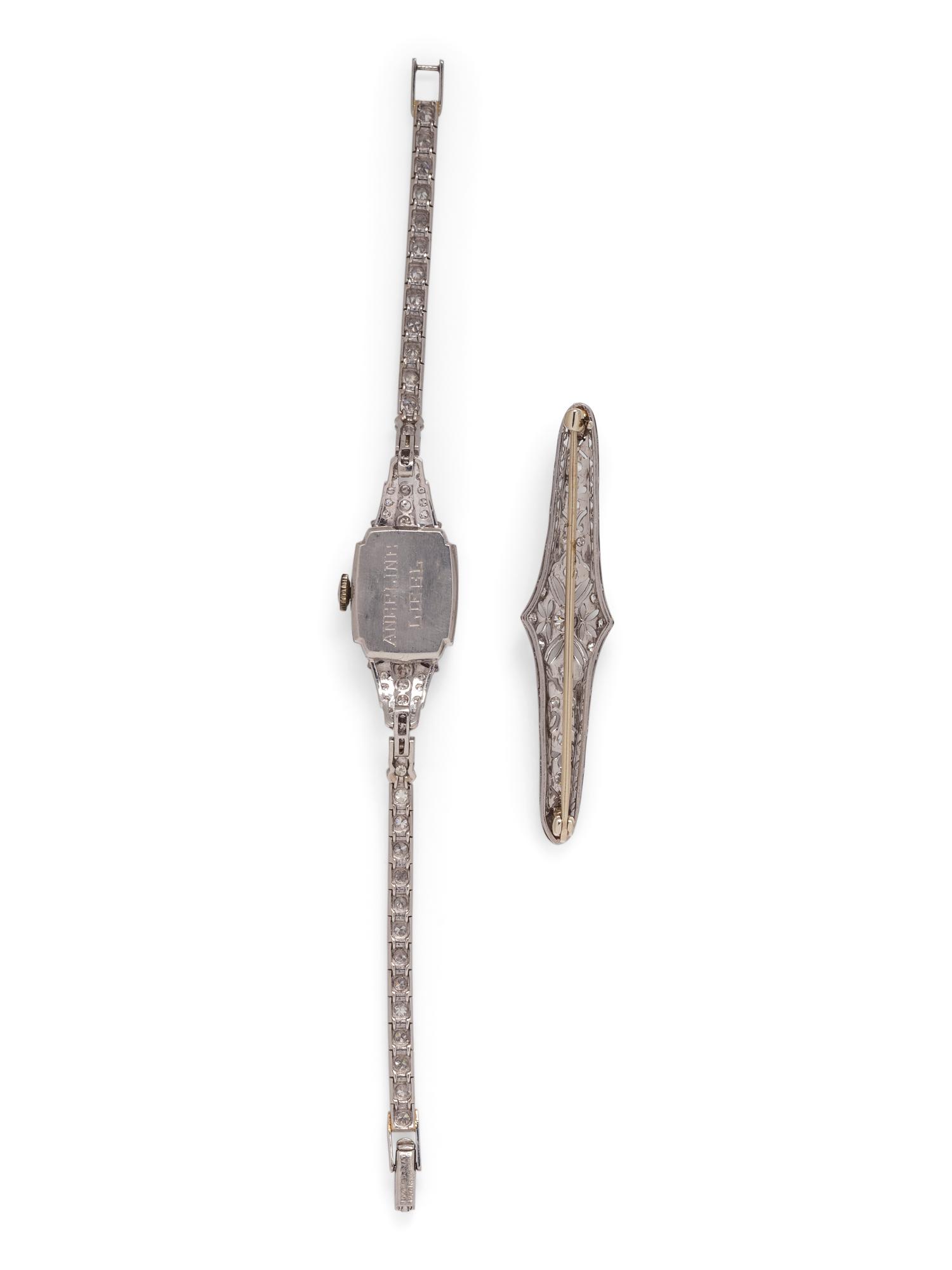 COLLECTION OF PLATINUM AND DIAMOND JEWELRY