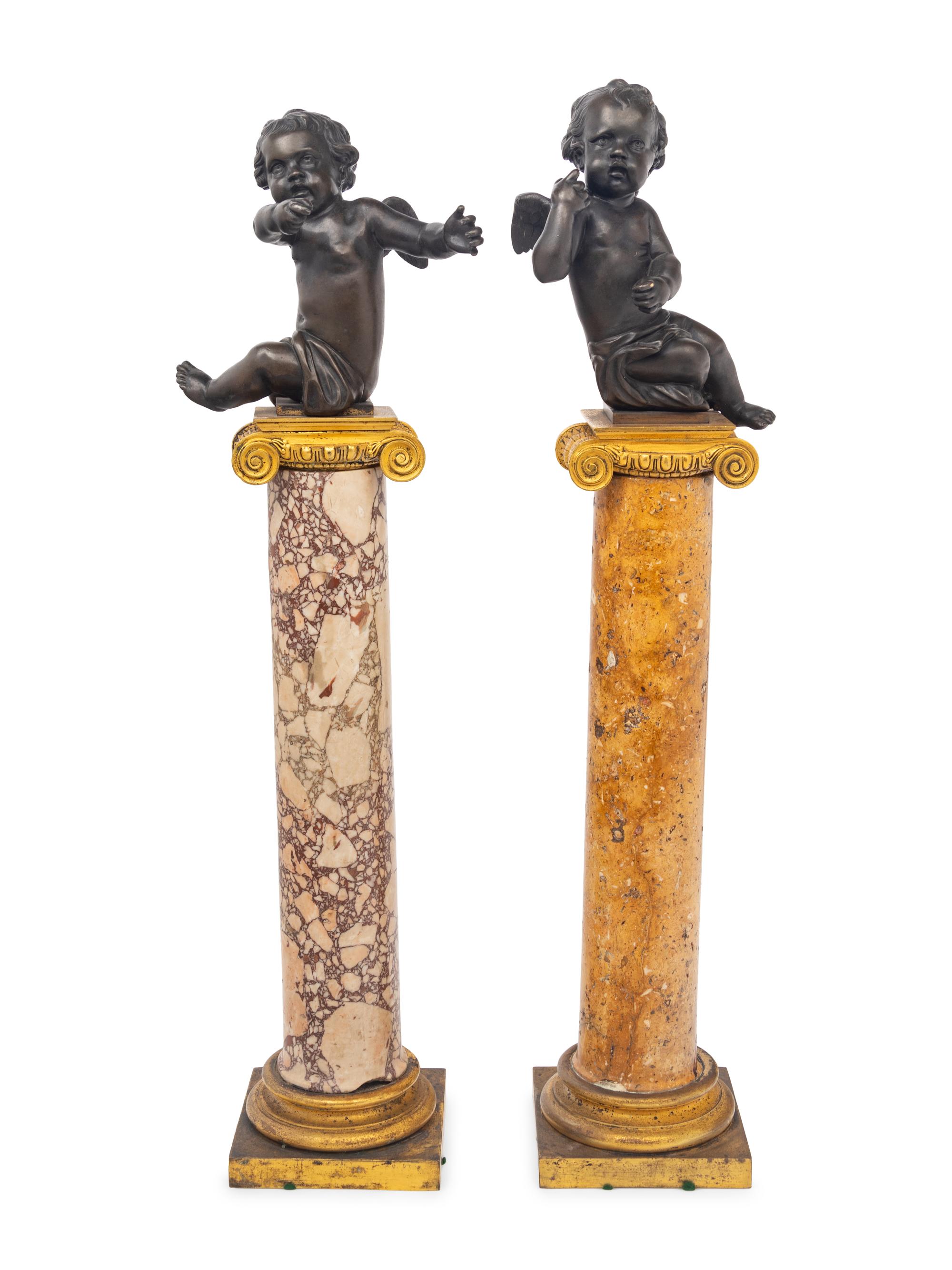A Near Pair of French Bronze Putti on Gilt Bronze Mounted Marble Columns