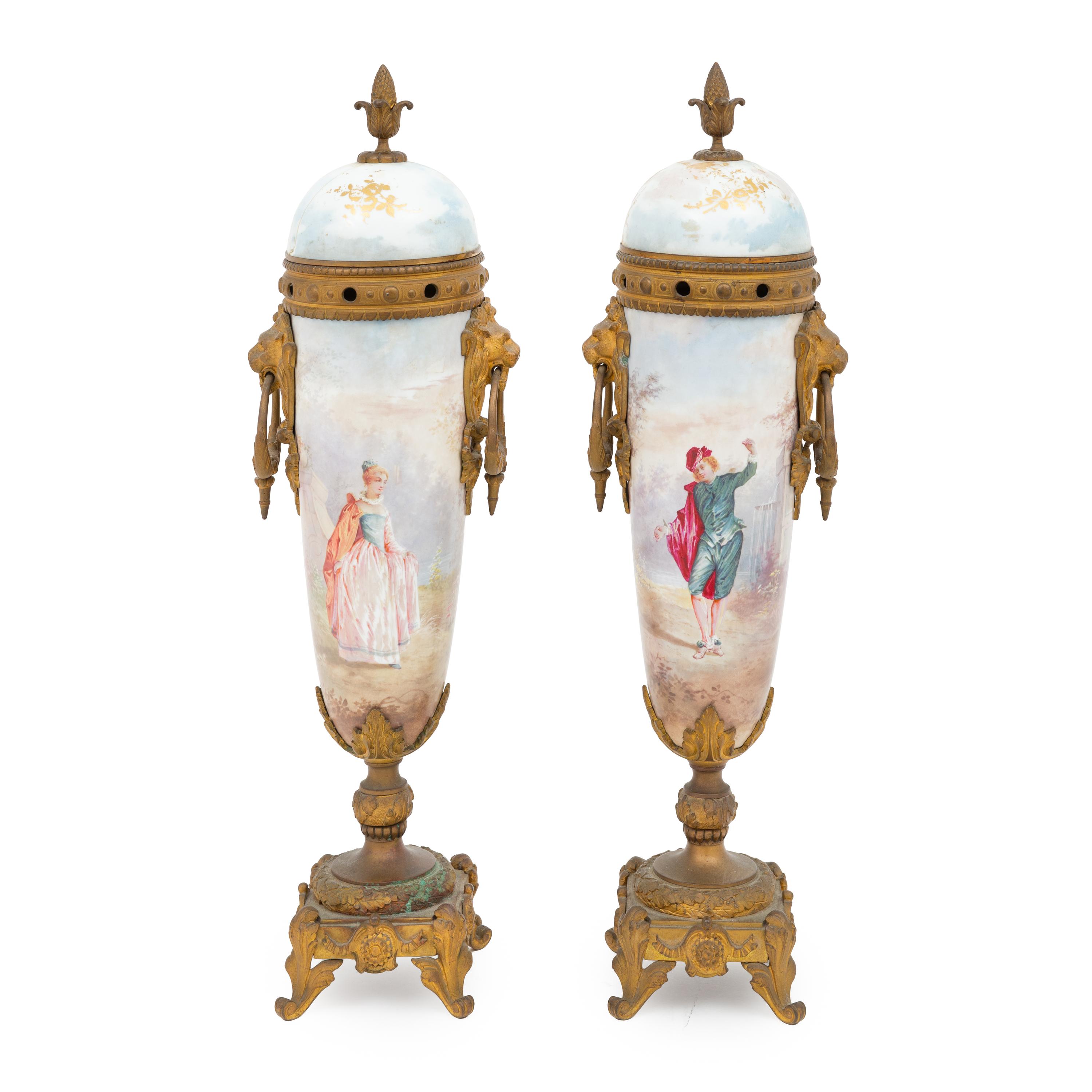 A Pair of Sèvres Style Porcelain and Gilt Bronze Mounted Potpourri Urns