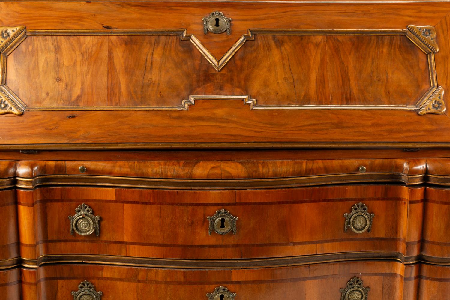 A Continental Parcel Gilt Walnut Slant-Front Bureau