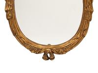 A Pair of Italian Rococo Style Gilded Mirrors