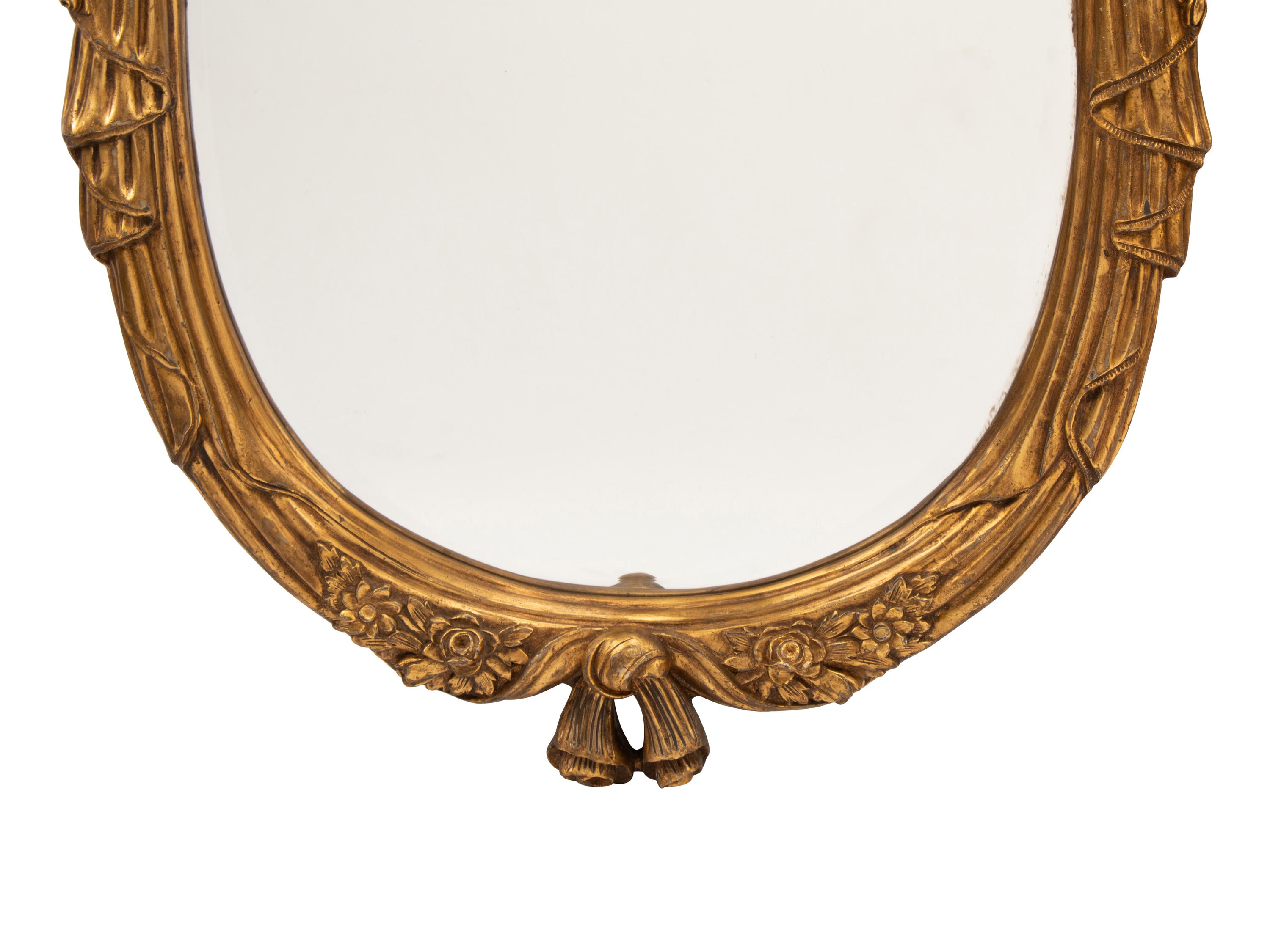 A Pair of Italian Rococo Style Gilded Mirrors