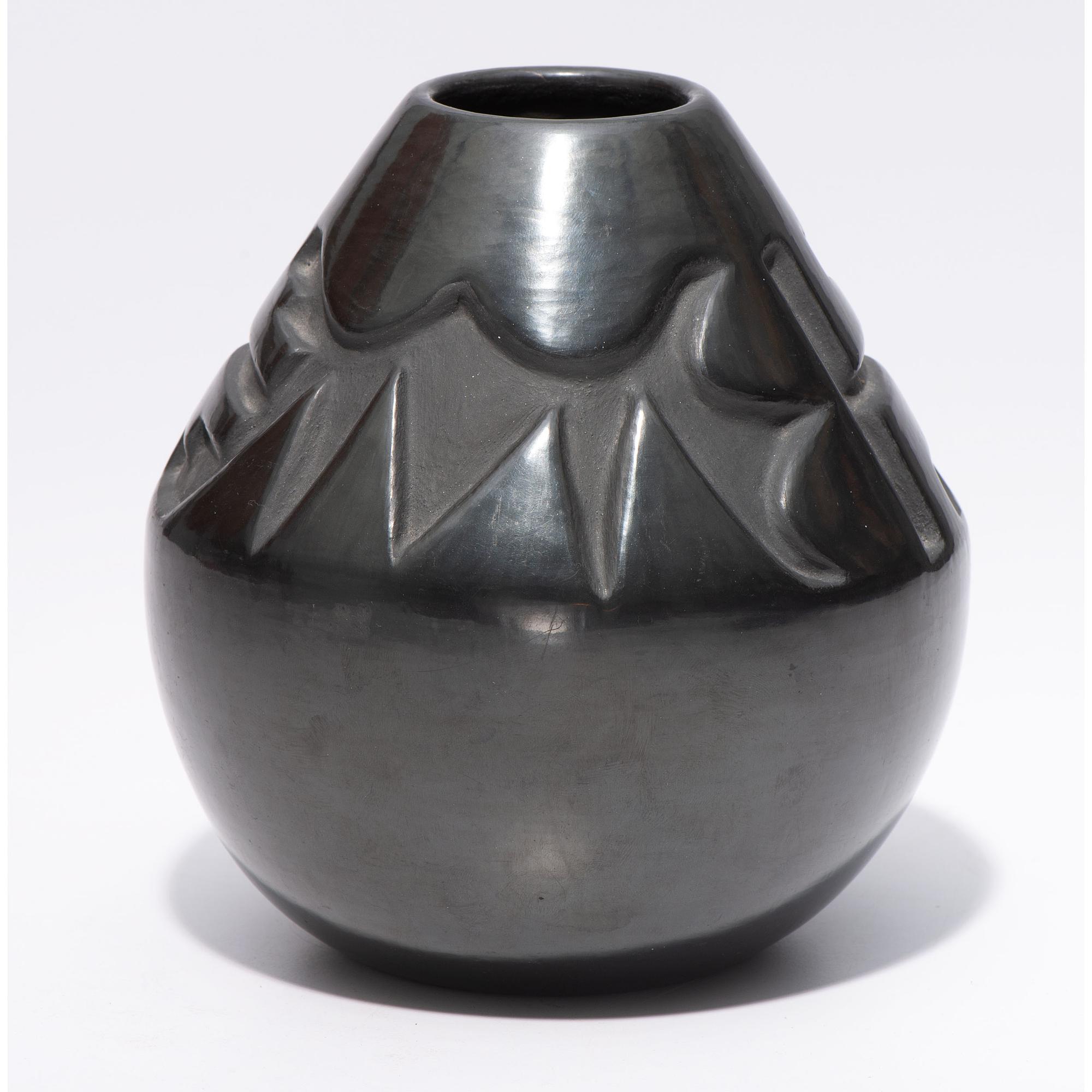 Deeply Carved Blackware Vase