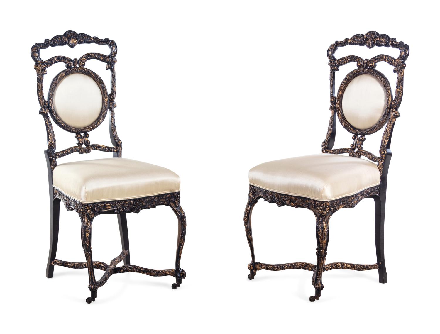 A Pair of Louis XV Style Ebonized and Gilded Side Chairs