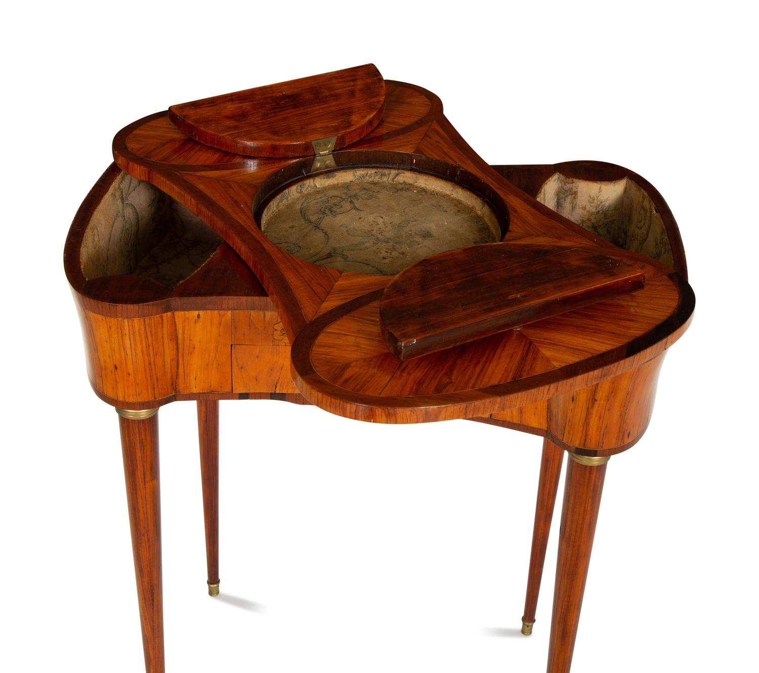 A Louis XVI Tulipwood and Marquetry Gilt Bronze-Mounted Sewing Table