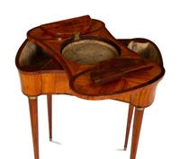 A Louis XVI Tulipwood and Marquetry Gilt Bronze-Mounted Sewing Table