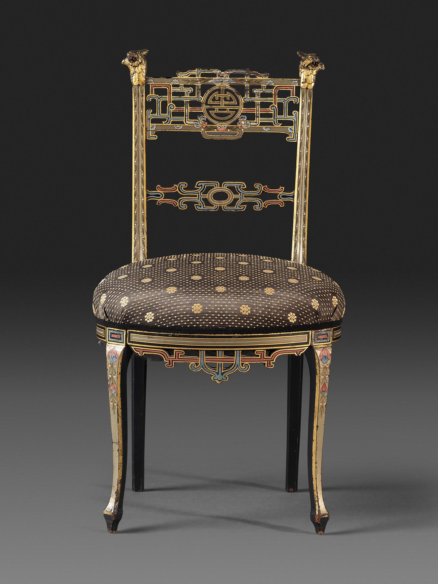 An Aesthetic Movement Painted, Parcel Gilt and Ebonized Bird-Carved Side Chair