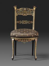 An Aesthetic Movement Painted, Parcel Gilt and Ebonized Bird-Carved Side Chair