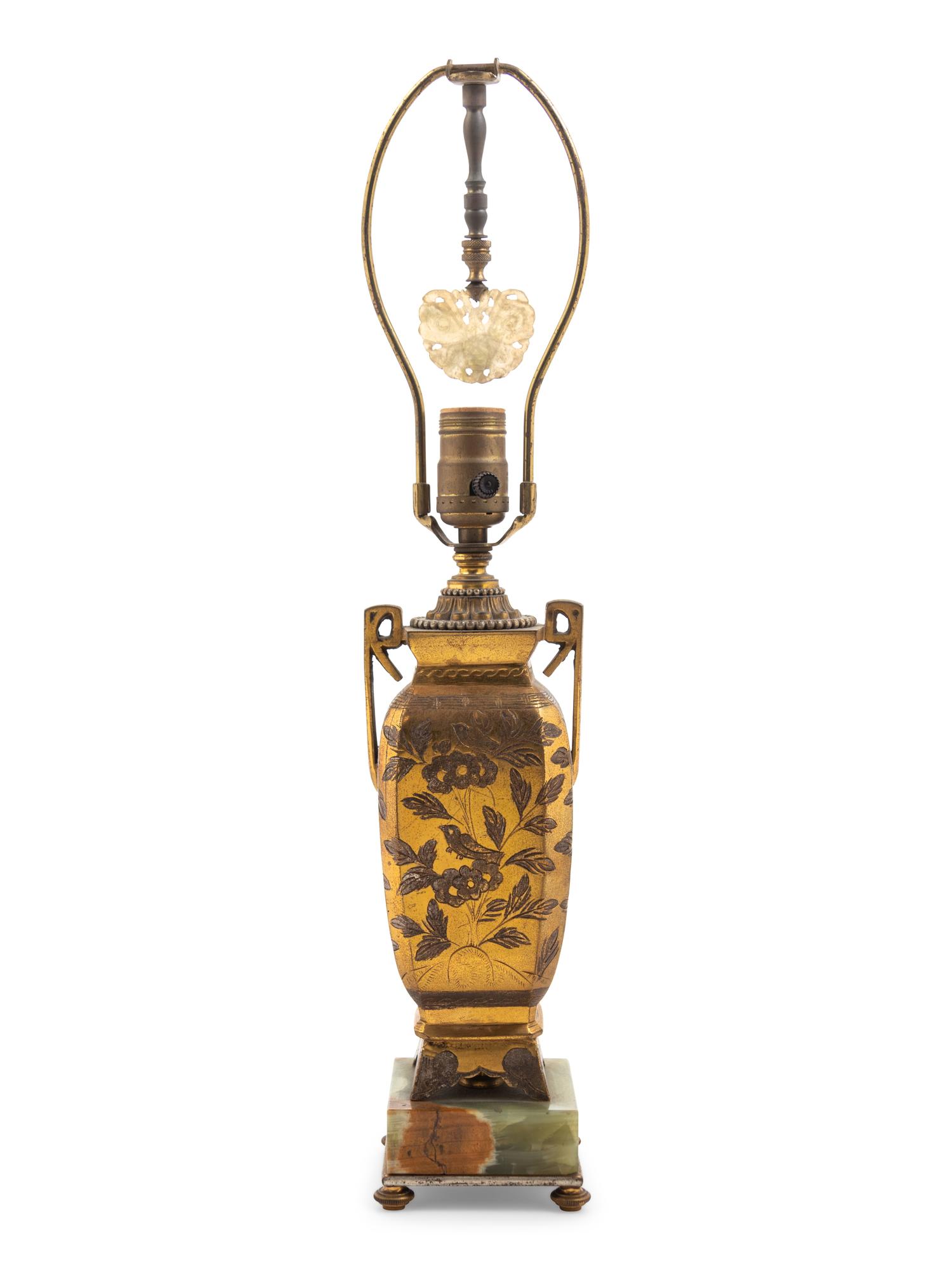 A Bronze and Onyx Mounted Lamp