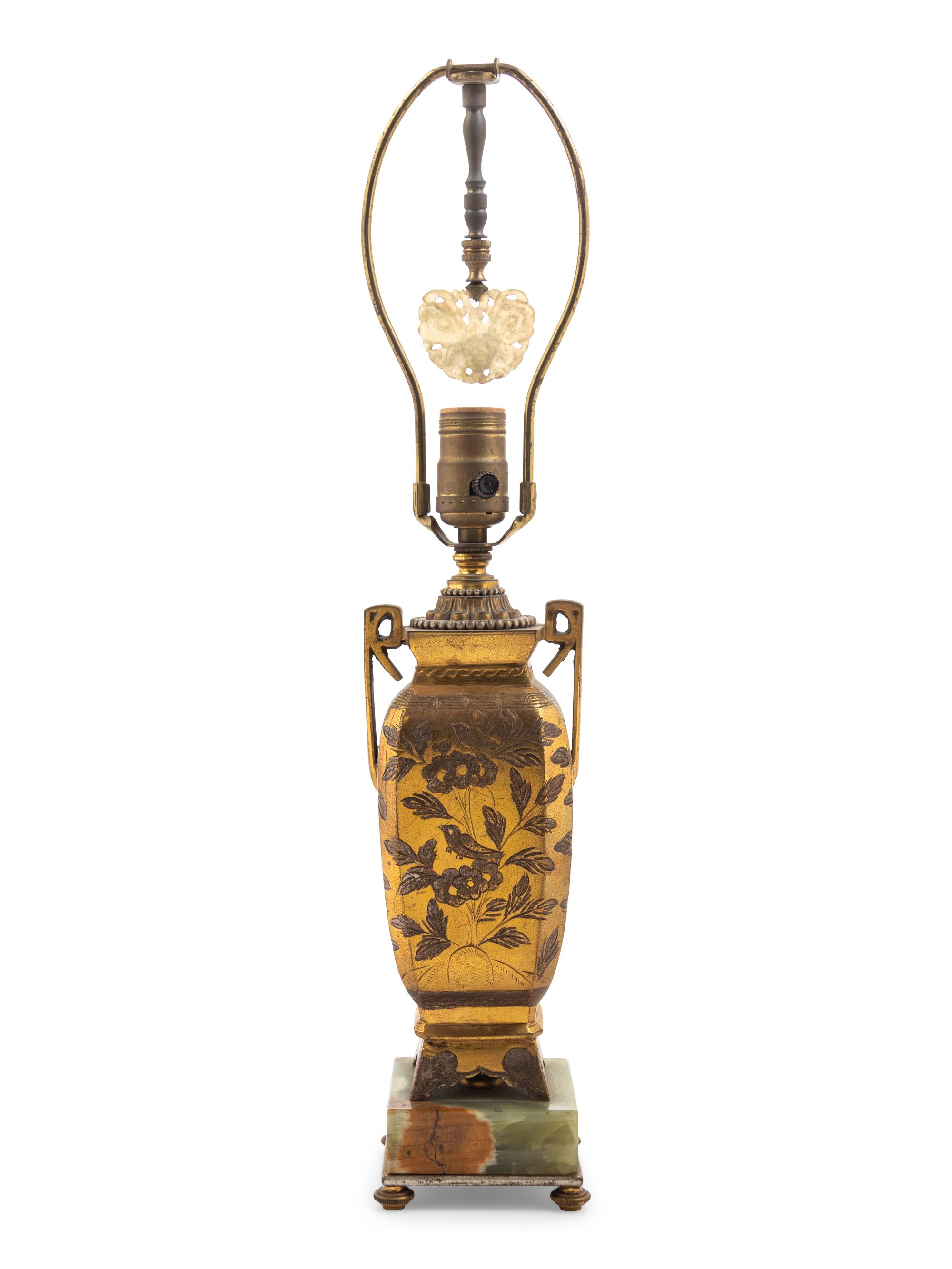 A Bronze and Onyx Mounted Lamp