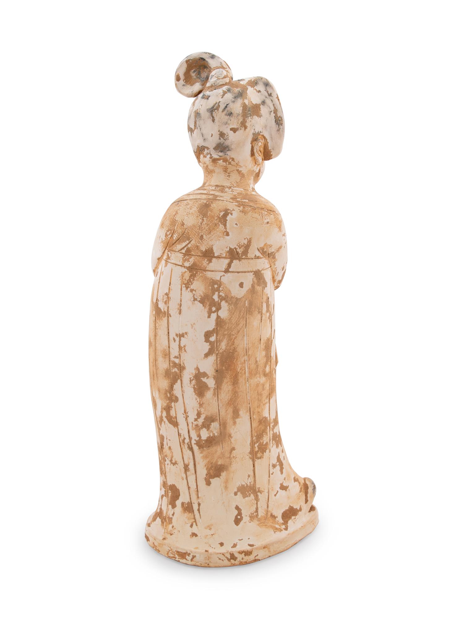 A Chinese Painted Pottery Figure of a Fat Lady