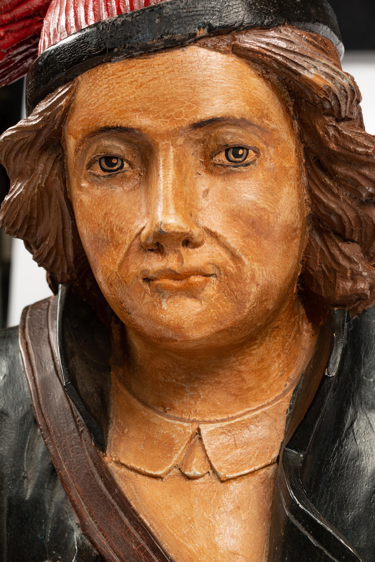 A Continental Painted Figure of a Man on a Barrel
