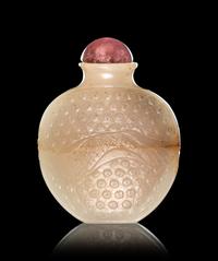 Two Carved Celadon Jade Snuff Bottles