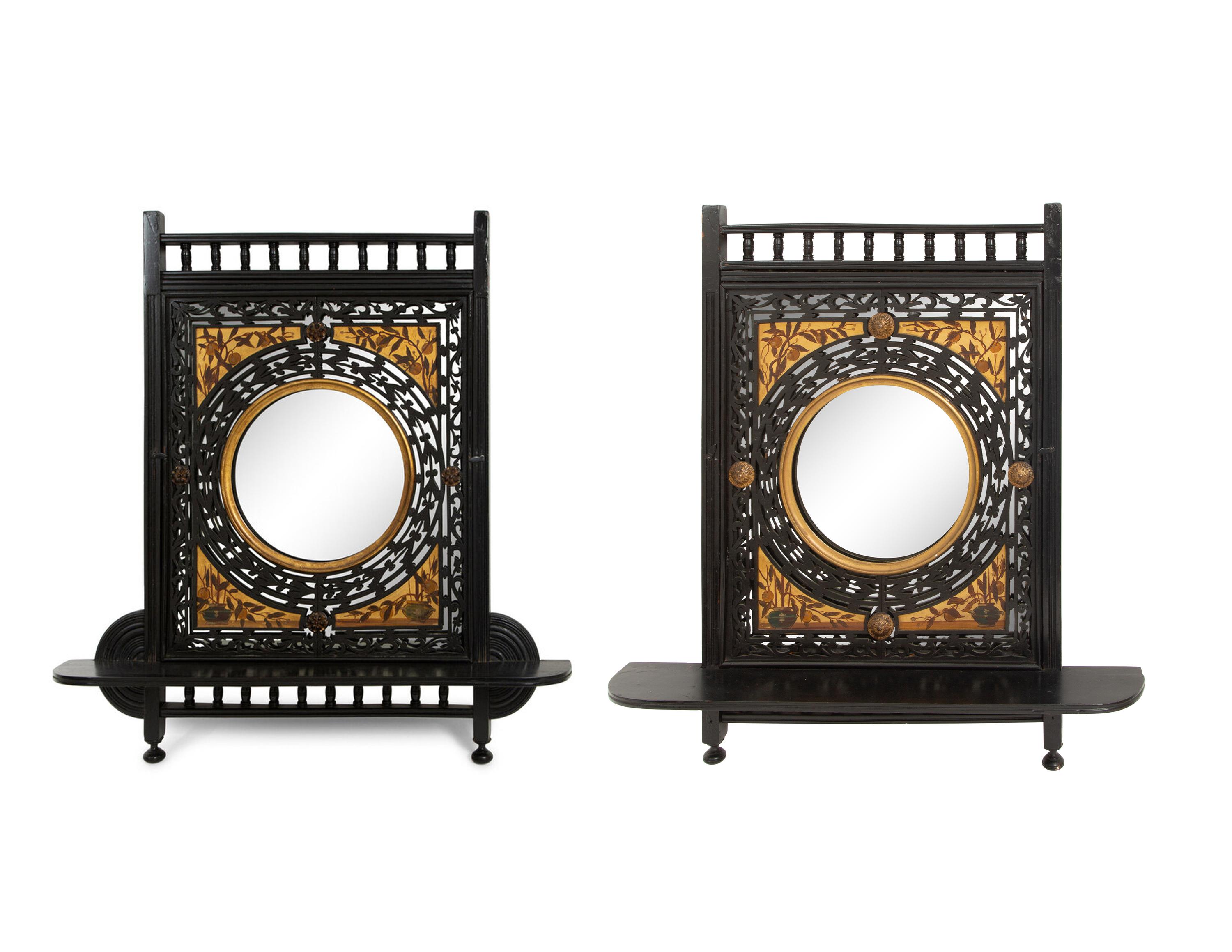 A Pair of Victorian Aesthetic Movement Ebonized, Painted and Parcel Gilt Mirrored Wall Brackets