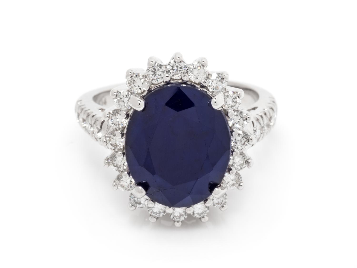 A 14 Karat White Gold, Sapphire and Diamond Ring,