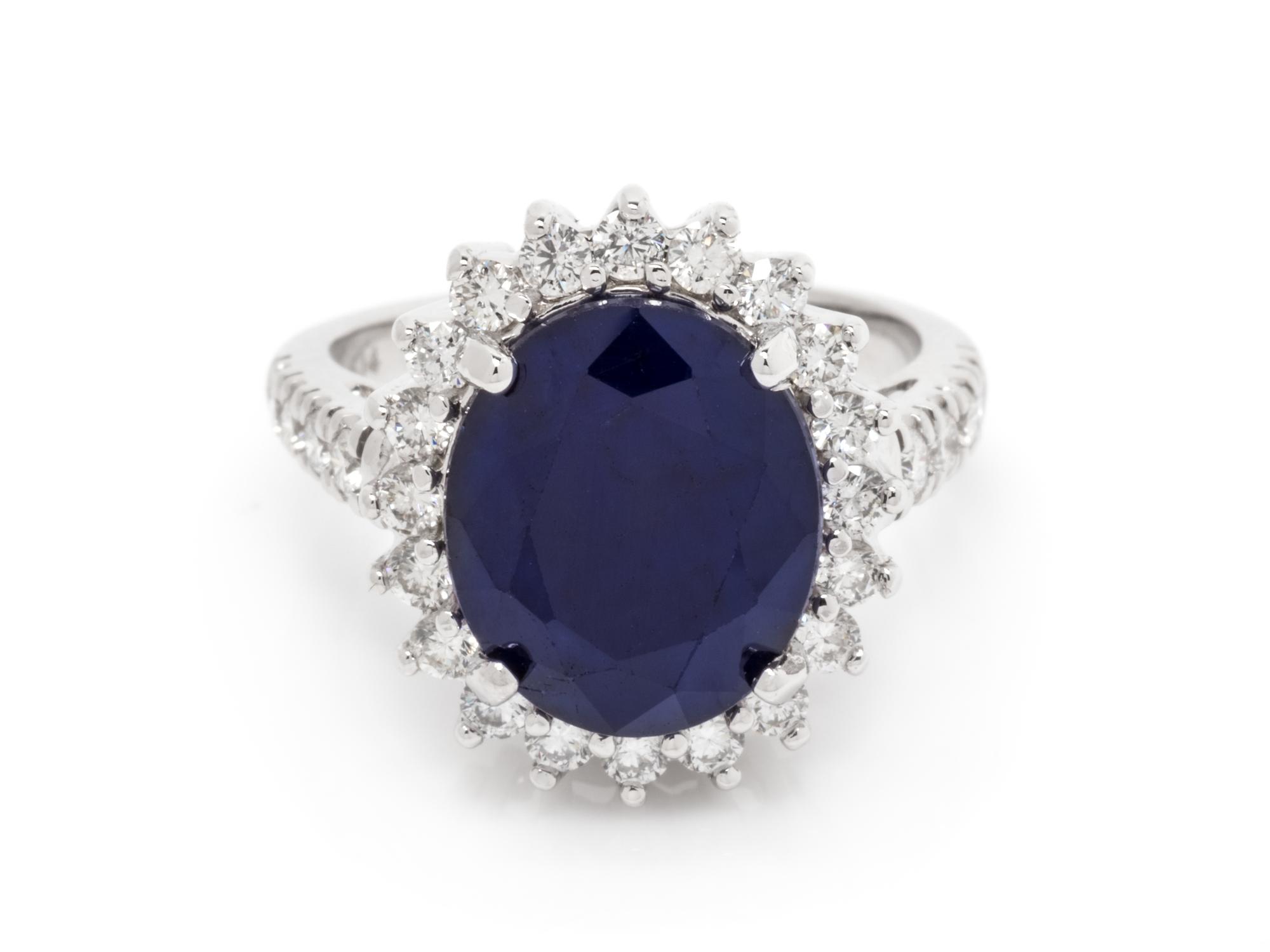 A 14 Karat White Gold, Sapphire and Diamond Ring,